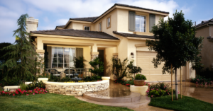 large stucco house after a rainstorm 