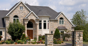 large house with a stone veneer front exterior