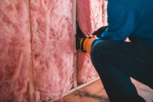 contractor replacing insulation
